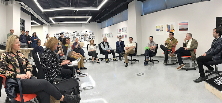 Group of faculty sitting around in a circle
