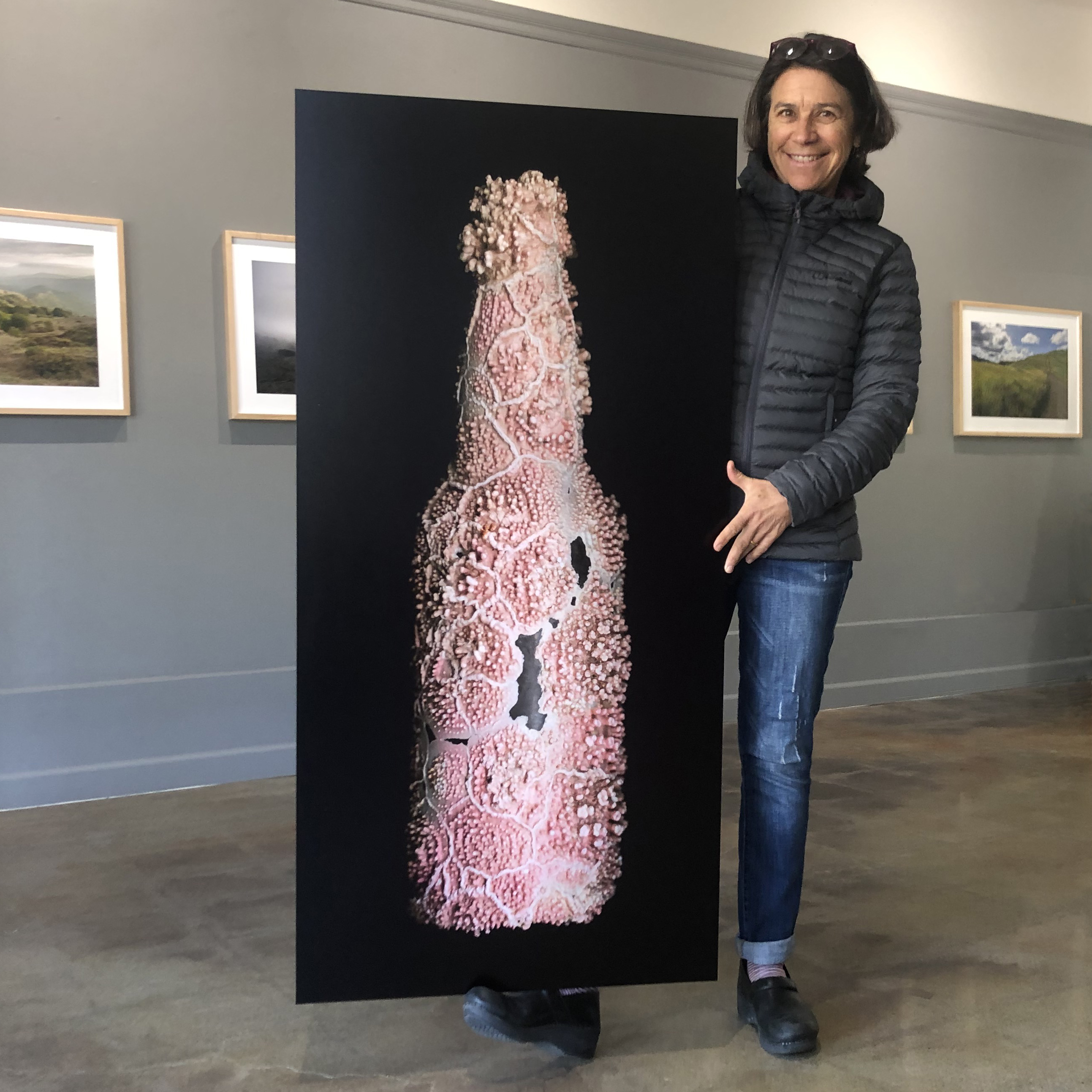 Artist Josie with art "Pink Coral in Algae"