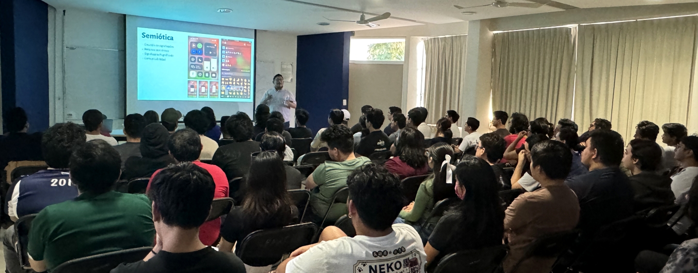 Professor Omar Sosa-Tzec giving a talk to students of FMAT UADY